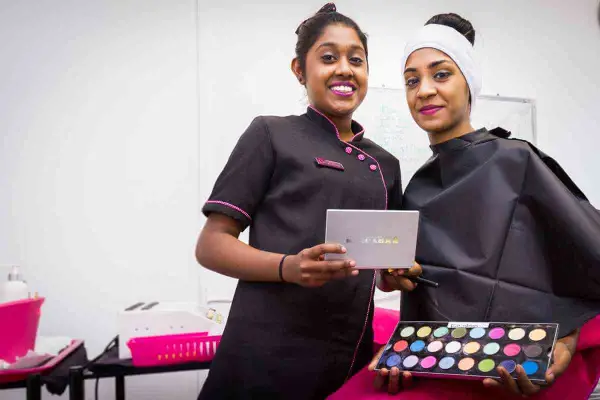 Students with a make up palette